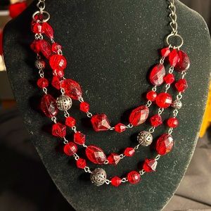 Unbranded pretty retro style 3 strand beaded necklace.